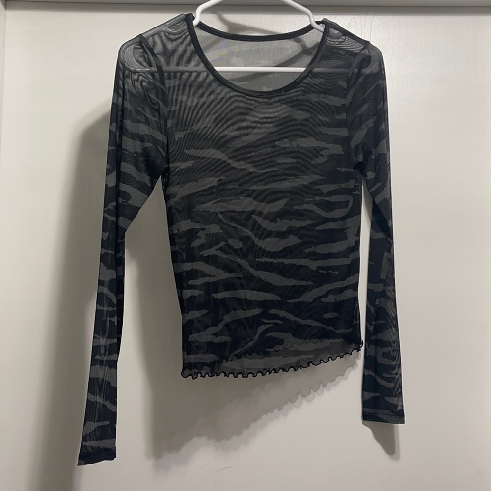 see through zebra print crop top. can’t remember the brand maybe forever 21